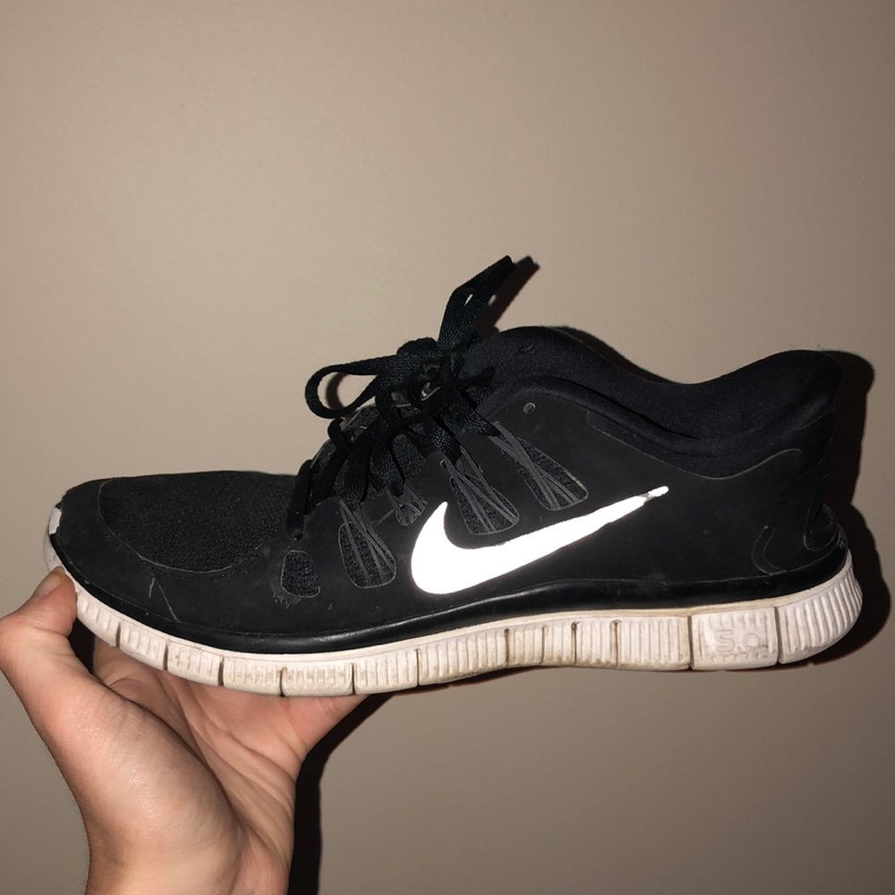 Lightly worn black Nike running sneakers